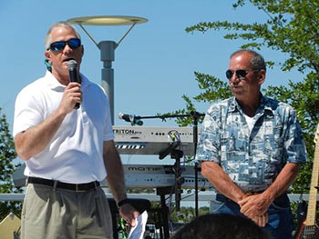 Senator Campsen giving Capt. Magwood the Order of the Palmetto Award at the 2011 Blessing of the Fleet.